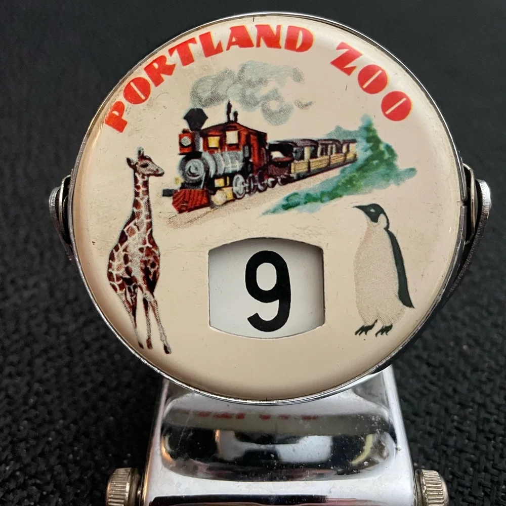 VTG metal perpetual flip calendar featuring Portland Zoo graphic